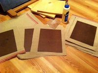 Using raw flax linen to make artist canvas panels.